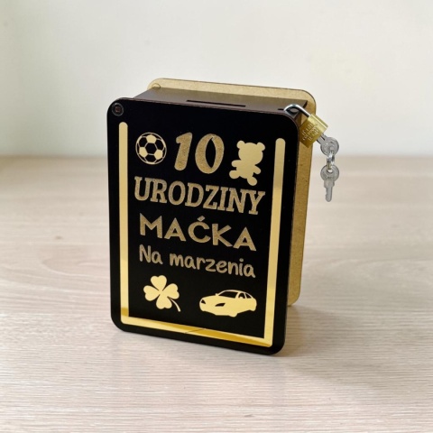 Personalizowana skarbonka ze złotą ramką i grafikami dla dziecka